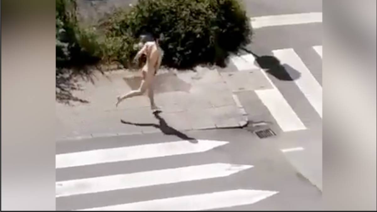 Coronavirus: Spanish police nab man running naked down street - AS USA